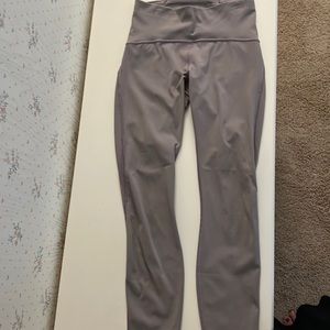 LuluLemon cropped leggings with mesh accent detail on sides.